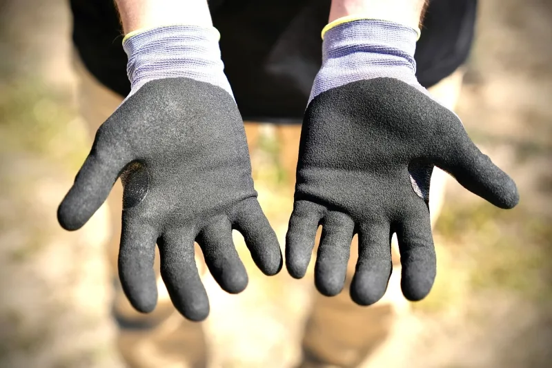 Close-up of Safer Grip by OPNBar micro-foam nitrile coated palms and fingers